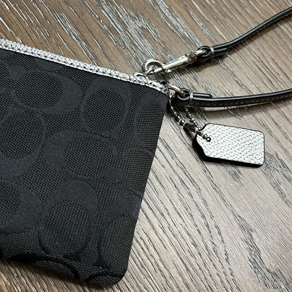 Coach black signature silver metallic leather edge wristlet
